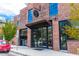 Transfer Co. Food Hall entrance with floor-to-ceiling glass and red brick exterior at 409 E Lee St, Raleigh, NC 27601
