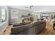 Spacious living room with hardwood floors and an open layout to the kitchen at 409 E Lee St, Raleigh, NC 27601