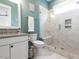Stylish bathroom with marble tile and frameless glass shower at 4104 Bankshire Ln, Raleigh, NC 27603
