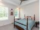 Bright bedroom with two windows, tray ceilings and carpet at 4104 Bankshire Ln, Raleigh, NC 27603