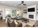 Spacious living room with a fireplace, hardwood floors, recessed lighting and an open floor plan at 4104 Bankshire Ln, Raleigh, NC 27603