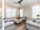 Cozy sitting room with neutral decor, comfortable seating, and an abundance of natural light at 4104 Bankshire Ln, Raleigh, NC 27603