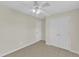 Bright bedroom featuring tile flooring and a ceiling fan at 430 Sir David Dr, Zebulon, NC 27597