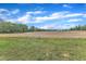 View of the field behind the property at 430 Sir David Dr, Zebulon, NC 27597
