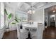 Elegant dining room with coffered ceiling, wainscoting, and bright natural light at 4420 Bonnie Loch Dr, Burlington, NC 27215