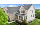 Beautiful two-story home featuring brick and siding and manicured lawn at 4420 Bonnie Loch Dr, Burlington, NC 27215