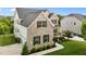 Beautiful two-story home featuring brick and siding, a two-car garage, and lovely landscaping at 4420 Bonnie Loch Dr, Burlington, NC 27215