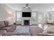 Spacious living room featuring fireplace, neutral tones, and open floor plan at 4420 Bonnie Loch Dr, Burlington, NC 27215