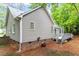 Exterior view features the home's siding, backyard and deck area at 5 Wembley Ct, Durham, NC 27705