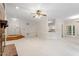 Spacious living area with a brick fireplace, and an open floor plan to other areas at 5 Wembley Ct, Durham, NC 27705