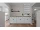 Dining room with custom built-in cabinetry and wood countertop at 5116 Knaresborough Rd, Raleigh, NC 27612