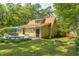 Charming backyard featuring a dining area and garden bed, ideal for relaxation and enjoyment at 520 Brittany Bay W, Raleigh, NC 27614