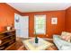Cozy seating area featuring a vibrant color scheme with patterned table and furniture at 520 Brittany Bay W, Raleigh, NC 27614