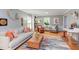 Bright living room featuring stylish furniture, hardwood floors, and an open layout, perfect for entertaining or relaxing at 520 Brittany Bay W, Raleigh, NC 27614