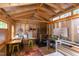 Spacious shed interior features natural light and custom shelving for various projects at 520 Brittany Bay W, Raleigh, NC 27614