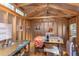 Bright and airy shed interior with shelving and ample space for hobbies or storage at 520 Brittany Bay W, Raleigh, NC 27614