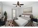 Cozy bedroom featuring a comfortable bed and access to the outdoors at 520 Camden Yards Way, Cary, NC 27519