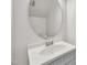 This half bathroom includes a modern sink and vanity at 5236 Turf Grass Ct, Raleigh, NC 27610