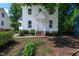 Charming two-story home featuring a classic white exterior and welcoming front porch at 5236 Turf Grass Ct, Raleigh, NC 27610