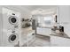 This staged kitchen features stainless appliances and an island at 5236 Turf Grass Ct, Raleigh, NC 27610