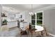 This staged kitchen features updated cabinets and appliances at 5236 Turf Grass Ct, Raleigh, NC 27610