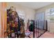 Bedroom featuring a clothes rack and window with natural light at 586 New Hope Church Rd, Apex, NC 27523