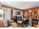 Cozy living room with hardwood floors, large window, and open layout with some clutter at 586 New Hope Church Rd, Apex, NC 27523