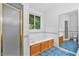 Bathroom with a soaking tub, separate shower, and a window with views of the greenery at 5939 Florasaline Dr, Mebane, NC 27302