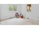 Cozy bedroom with neutral carpet and two windows for natural light at 5939 Florasaline Dr, Mebane, NC 27302