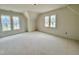 Bright room featuring large windows with natural light and fresh paint, perfect for relaxation at 6501 Burnette Flower Way, Raleigh, NC 27612