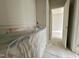 Hallway with trim and a view to another room at 6501 Burnette Flower Way, Raleigh, NC 27612