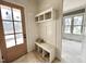 Mudroom boasting built-in storage and bench near the entrance at 6501 Burnette Flower Way, Raleigh, NC 27612