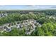 Aerial view of suburban houses and lush green trees at 6604 Frogstool Ln, Raleigh, NC 27610