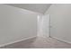 Neutral bedroom with an open door and entry to more rooms at 6604 Frogstool Ln, Raleigh, NC 27610