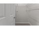 Walk-in closet including shelving, carpet, and ample space for storage at 6604 Frogstool Ln, Raleigh, NC 27610