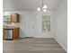 Kitchen featuring stainless steel appliances, natural light, and granite countertops at 6604 Frogstool Ln, Raleigh, NC 27610