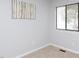 Bright and airy bedroom features neutral carpet and natural light at 7353 Sandy Creek Dr, Raleigh, NC 27614