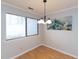 Bright dining area with large window and chandelier at 7353 Sandy Creek Dr, Raleigh, NC 27614