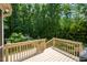 Expansive back deck offers a great view of the backyard with mature trees for relaxation and entertainment at 776 Legend Oaks Dr, Chapel Hill, NC 27517
