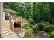This home features a spacious backyard that connects to the back deck with stairs, great for outdoor living at 776 Legend Oaks Dr, Chapel Hill, NC 27517