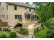 Expansive backyard featuring a large deck, screened porch, and an inviting hot tub at 776 Legend Oaks Dr, Chapel Hill, NC 27517