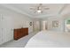 Spacious bedroom features a trey ceiling, plush carpeting, and large dresser at 776 Legend Oaks Dr, Chapel Hill, NC 27517