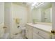 Bathroom featuring a tile floor, white vanity, and a large mirror at 803 Churchill Dr, Chapel Hill, NC 27517