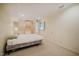 Bedroom features carpet flooring, a bed, and a window at 803 Churchill Dr, Chapel Hill, NC 27517