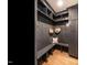 Custom mudroom with built-in bench, hooks, and storage, perfect for organizing outerwear and accessories at 813 Faulkner Pl, Raleigh, NC 27609