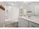 Neutral bathroom with shower, tub, white vanity and tile floors at 829 Churton Pl, Cary, NC 27518