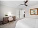 Bedroom with carpet, ceiling fan, dark wood desk and art at 829 Churton Pl, Cary, NC 27518
