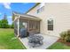 Backyard patio with grill and fire pit, perfect for outdoor gatherings at 839 Old Towne Dr, Elon, NC 27244