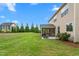Spacious backyard with screened porch and storage shed, perfect for outdoor activities at 839 Old Towne Dr, Elon, NC 27244