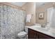 Bathroom featuring a floral shower curtain and a modern vanity at 839 Old Towne Dr, Elon, NC 27244